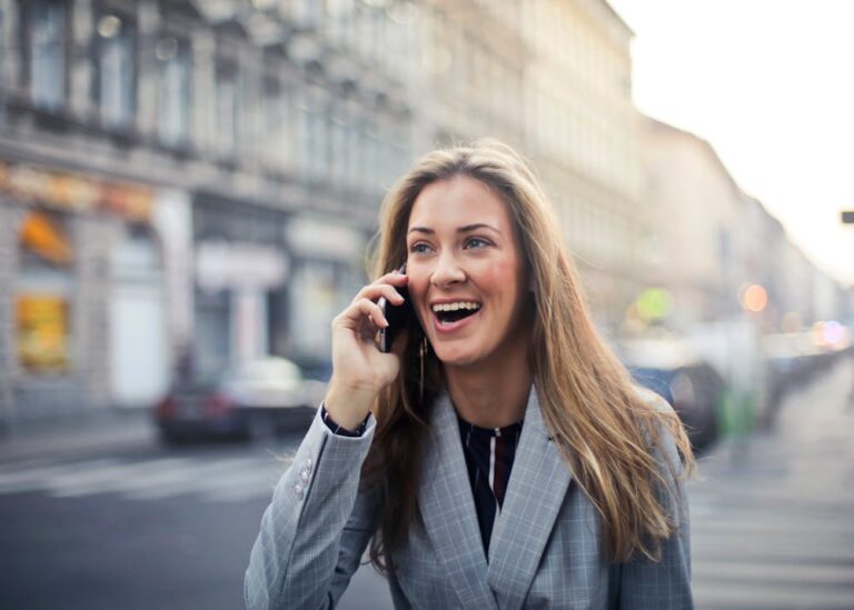 Photo of a working woman taking a phone call on the streets of Budapest in Hungary
