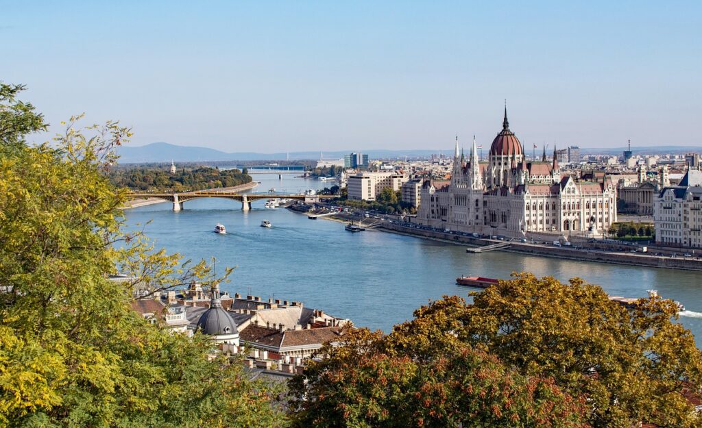 Side-by-side conceptual visual comparing the Hungary Golden Visa fund and donation investment options